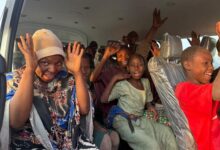 The rescued school children in one of the buses conveying them