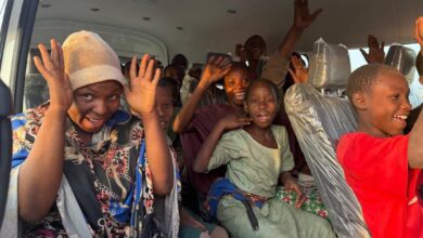 The rescued school children in one of the buses conveying them
