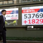 Asian markets rise with a political bump for Tokyo stocks