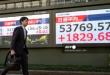 Asian markets rise with a political bump for Tokyo stocks