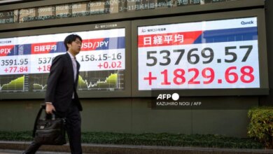 Asian markets rise with a political bump for Tokyo stocks